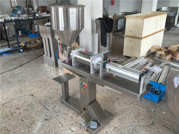 Máquina de recheo de mel sen cabeza automática