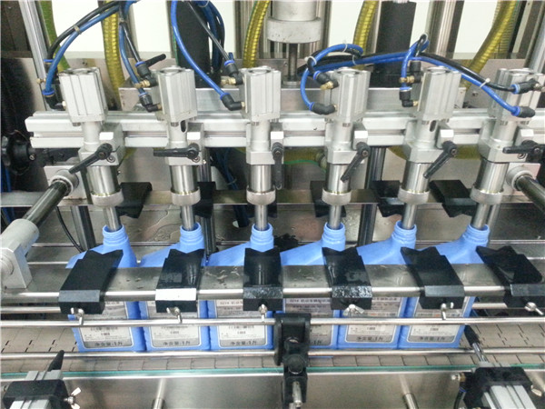 Máquina automática de recheo de aceite de motor de 6 cabezas